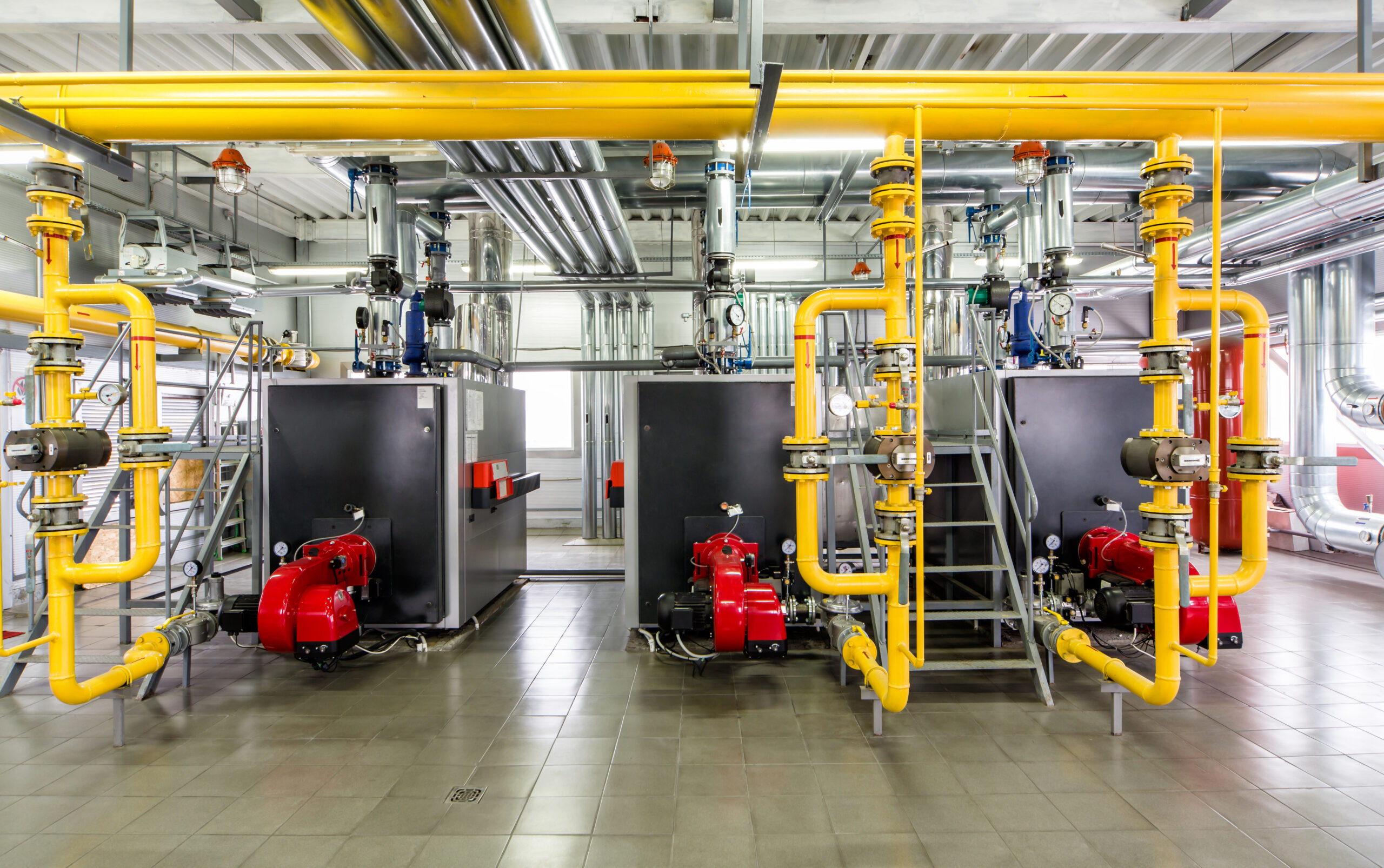 The interior of gas boiler, with three boilers. The interior of gas boiler, with three boilers.